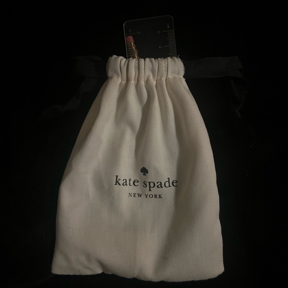 Kate Spade New York pencil case with pencil sharpener, eraser, pencil and ruler